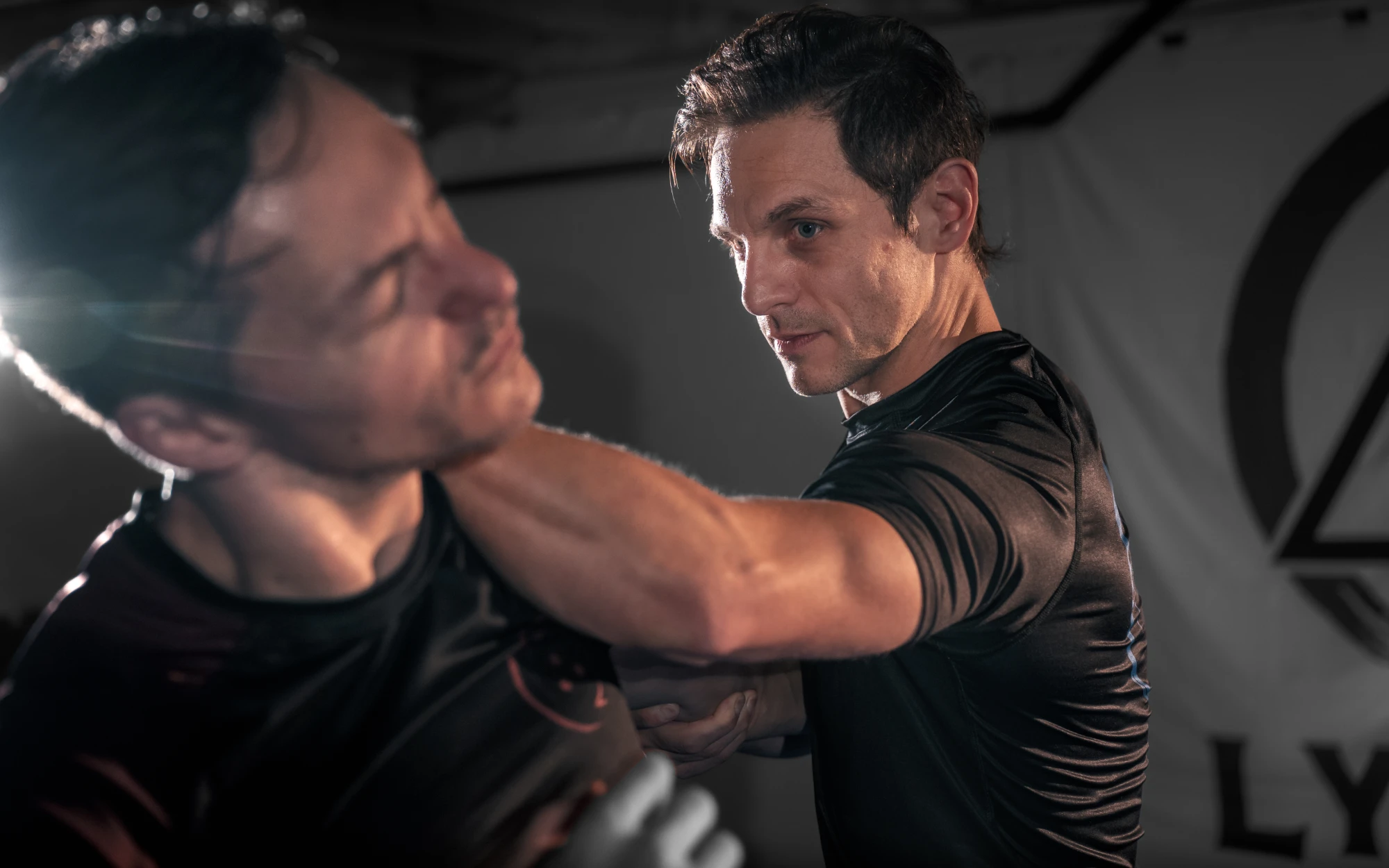 Partners exploring close-range contact and striking