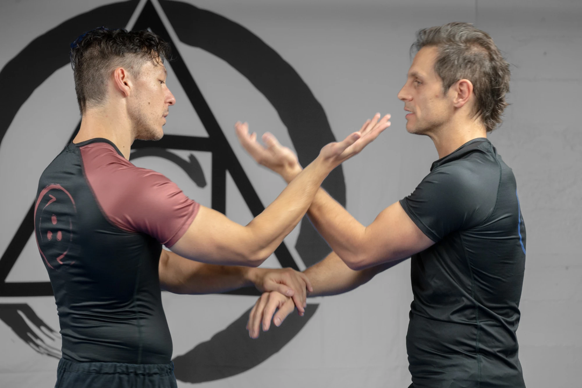 Partners working on close-range hand contact