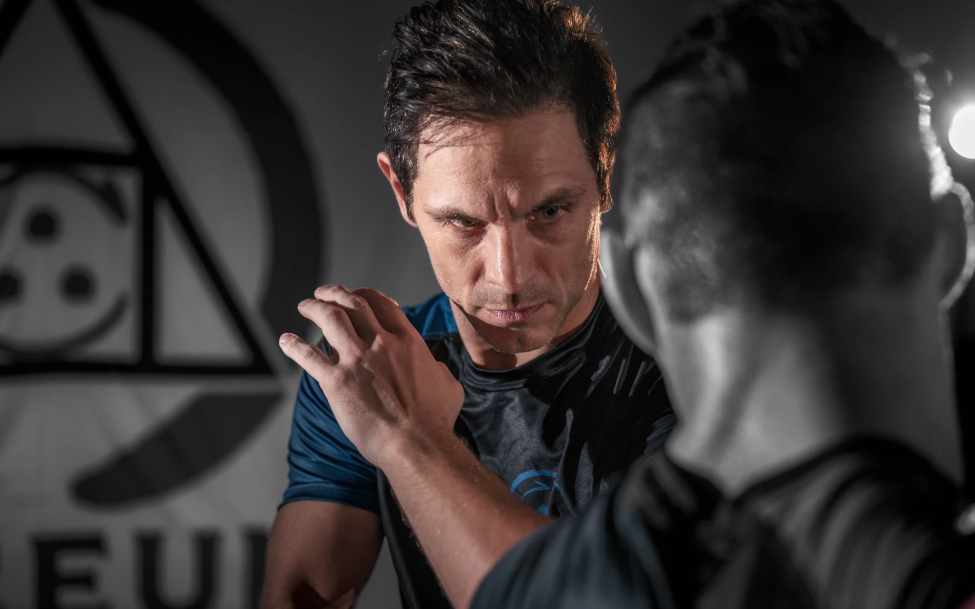 MKG Milwaukee partners practicing martial arts together